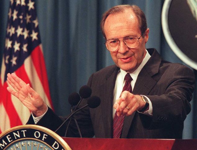 US Defense Secretary William Perry points to a rep